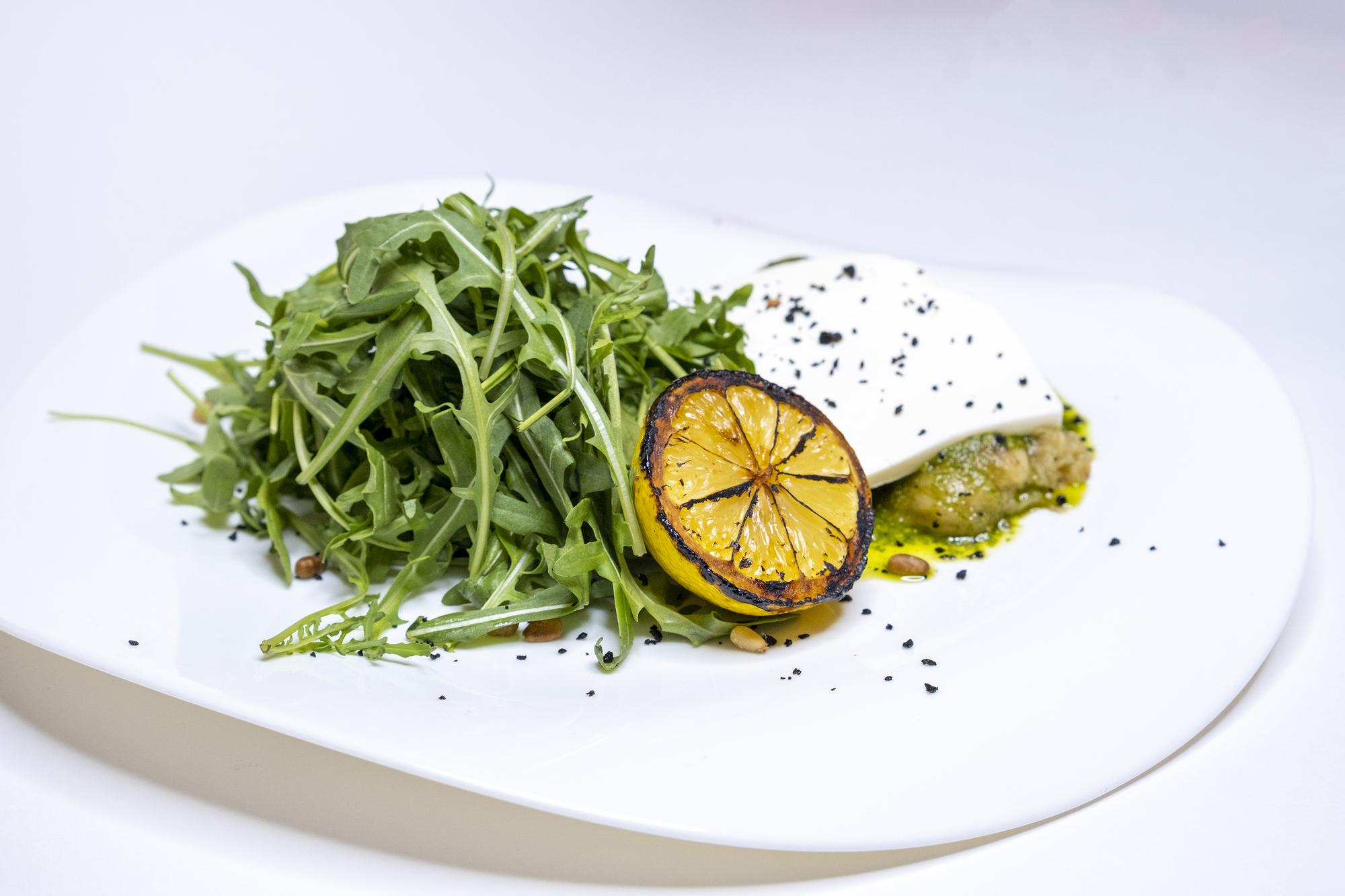 Plated seafood with microgreens